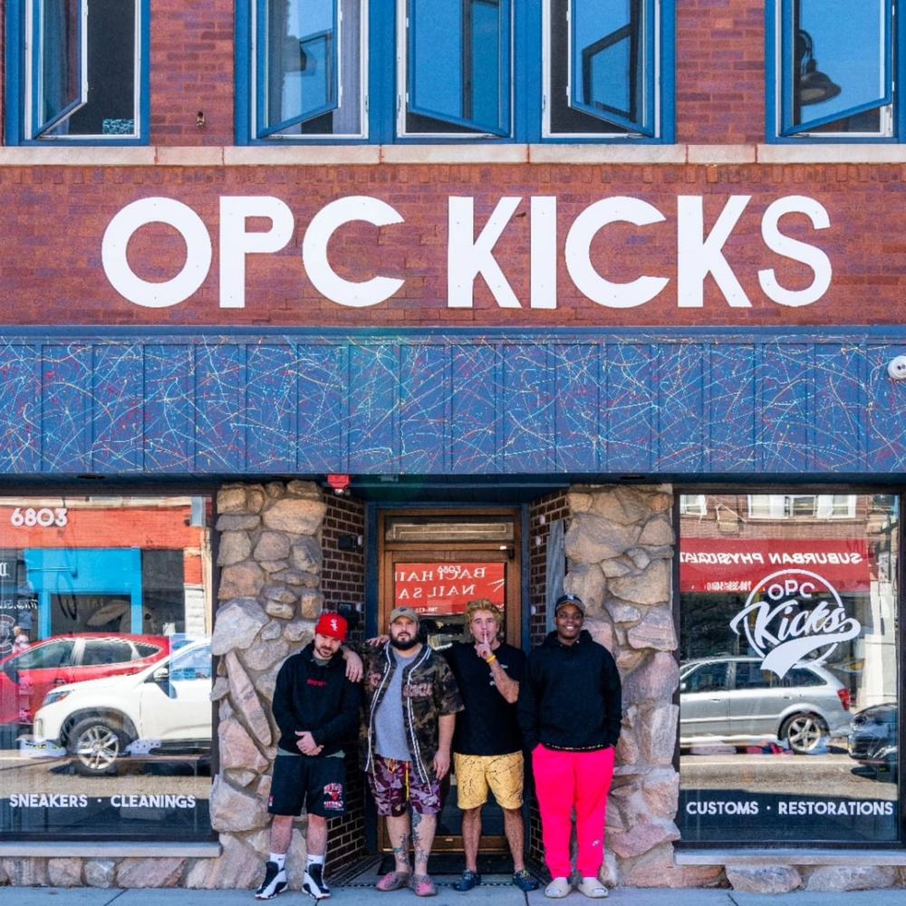 The OPC Kicks storefront on Roosevelt Road in Berwyn, with the team out front